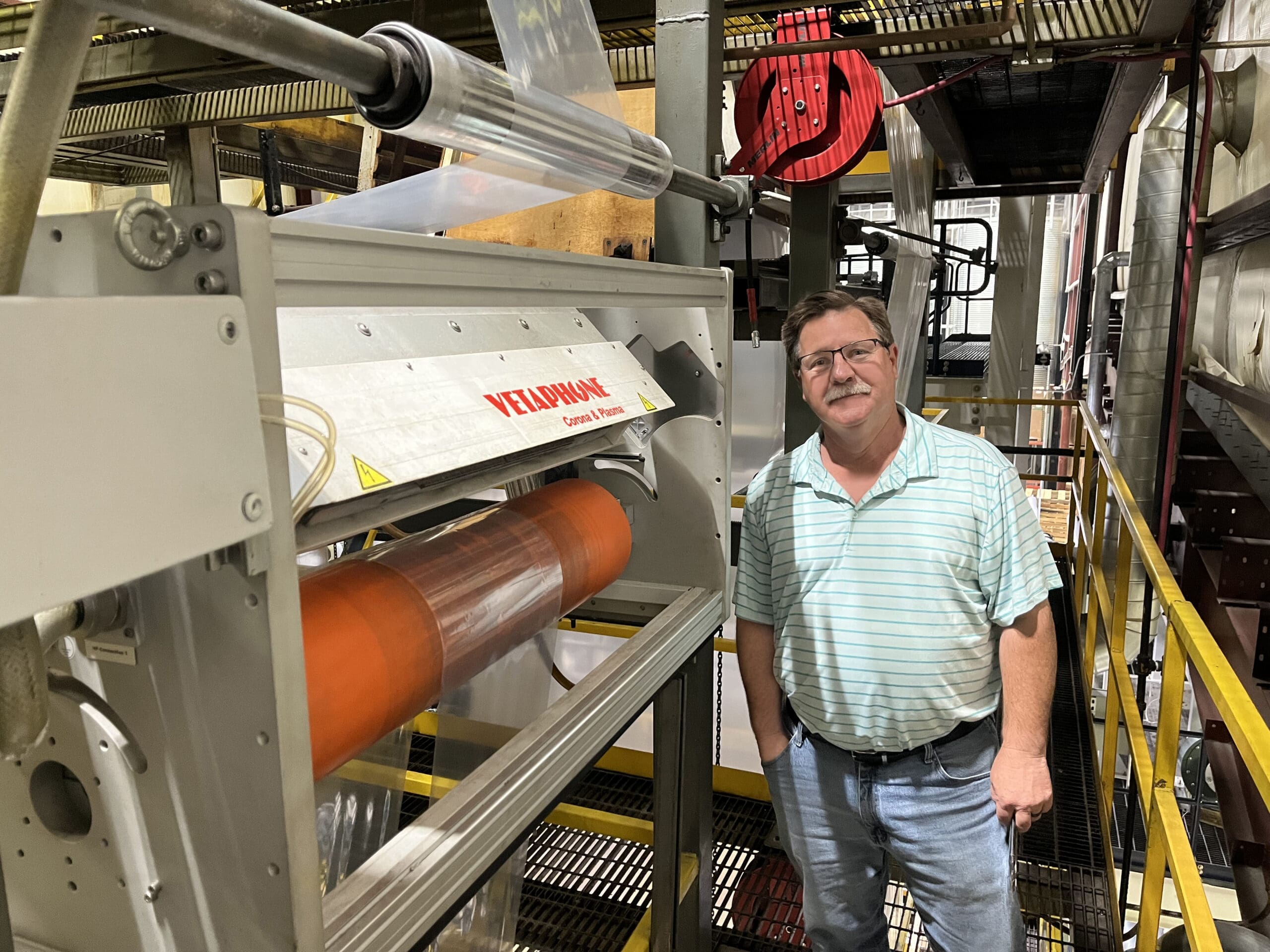 A-PAC:Tim Takken (Plant Manager) says his Vetaphone corona units provide consistent high-quality surface treatment